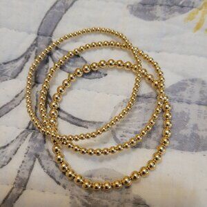 Three 14k gold filled bracelets